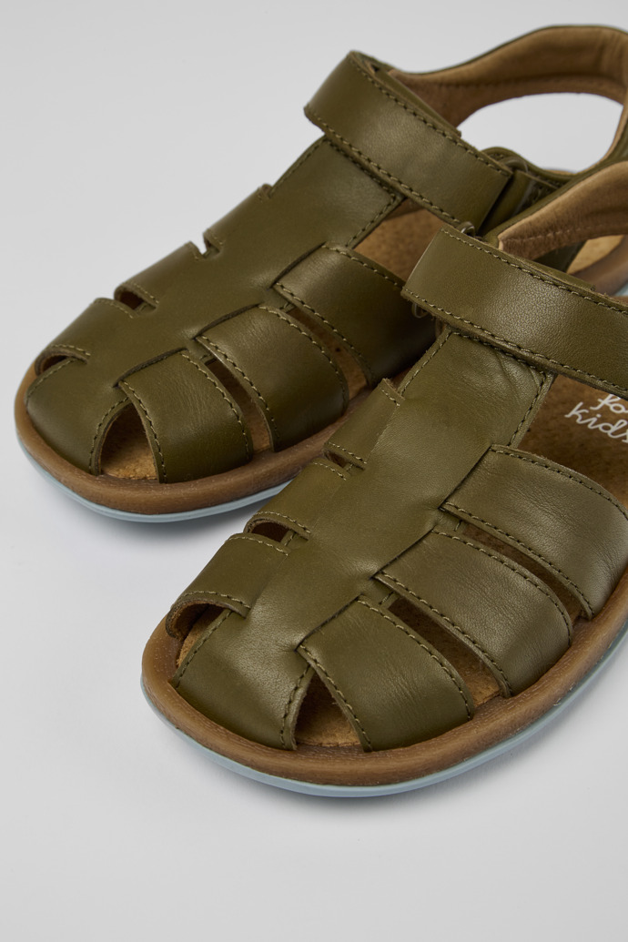 Close-up view of Bicho Green leather sandals for kids