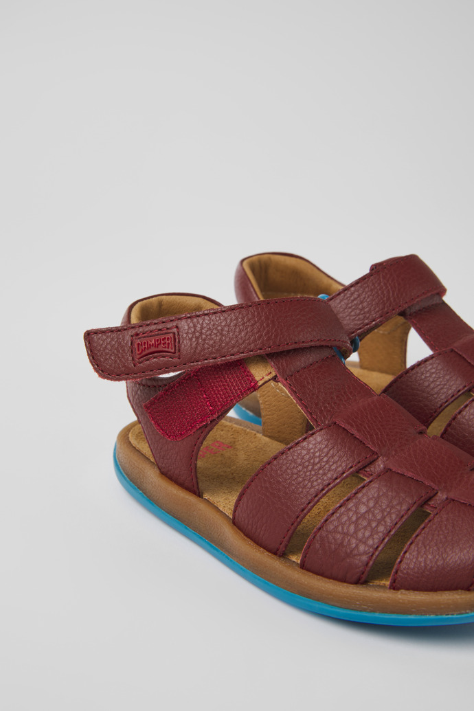 Close-up view of Bicho Burgundy leather sandals for kids