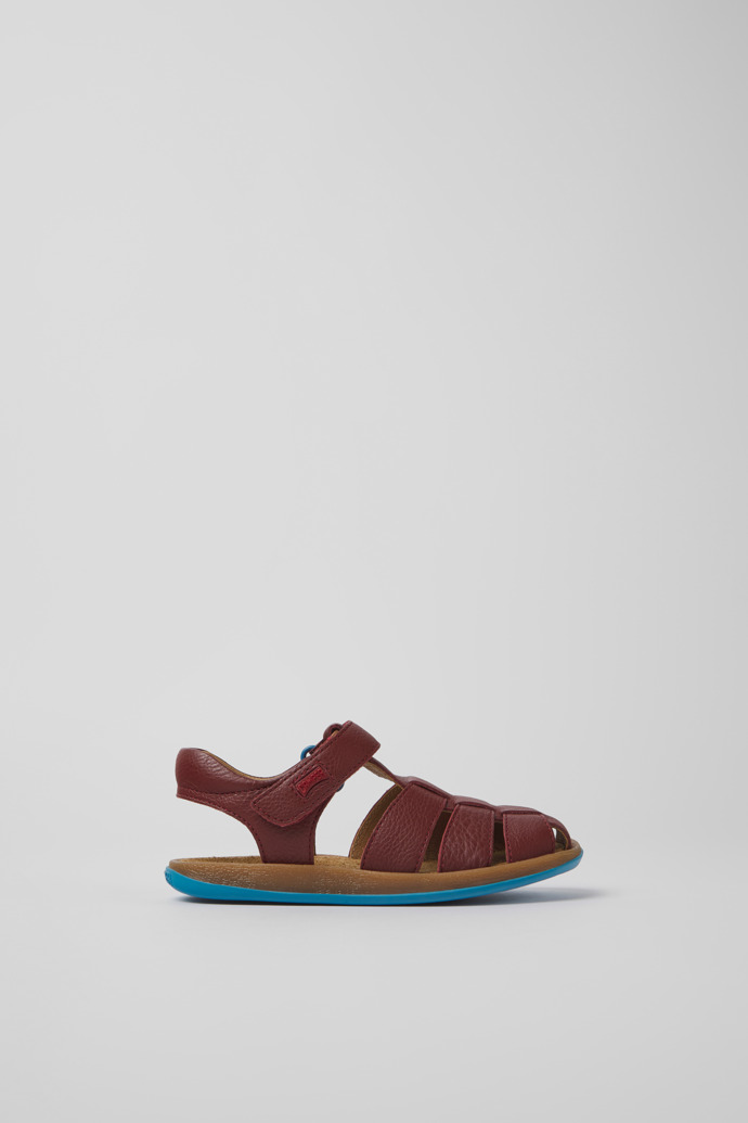Side view of Bicho Burgundy leather sandals for kids