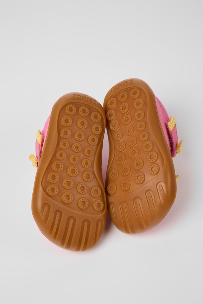 The soles of Peu Pink leather shoes for kids