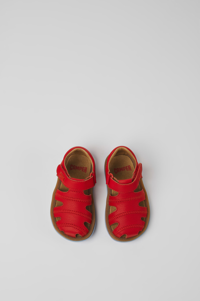 Overhead view of Bicho Red leather sandals for kids
