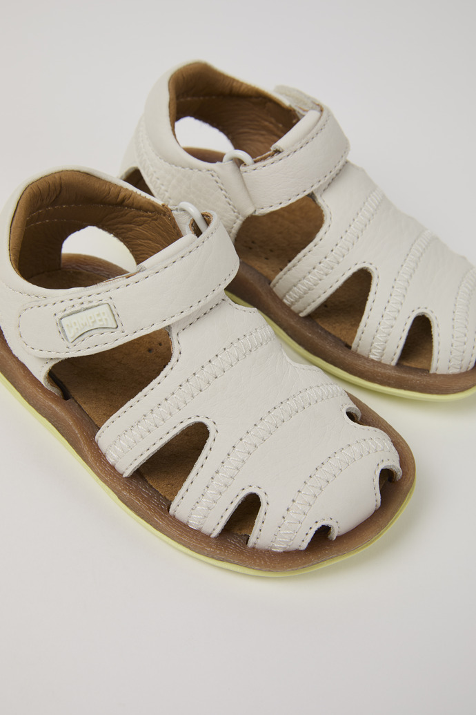 Close-up view of Bicho White Leather Kids' Closed Sandal.