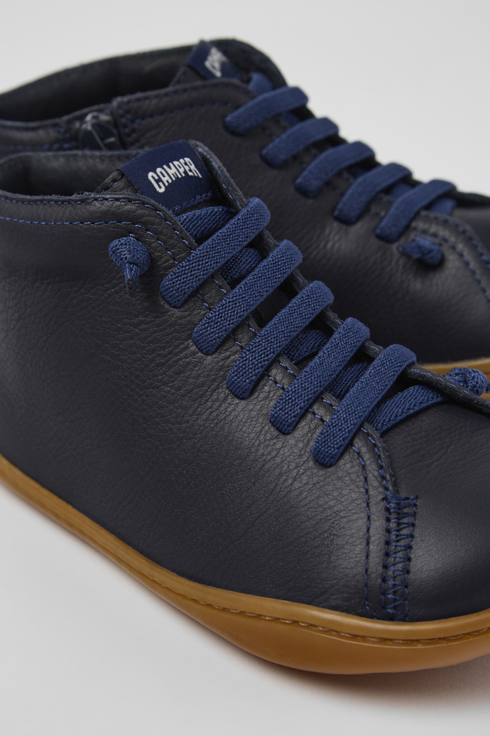 Close-up view of Peu Navy blue leather ankle boots for kids