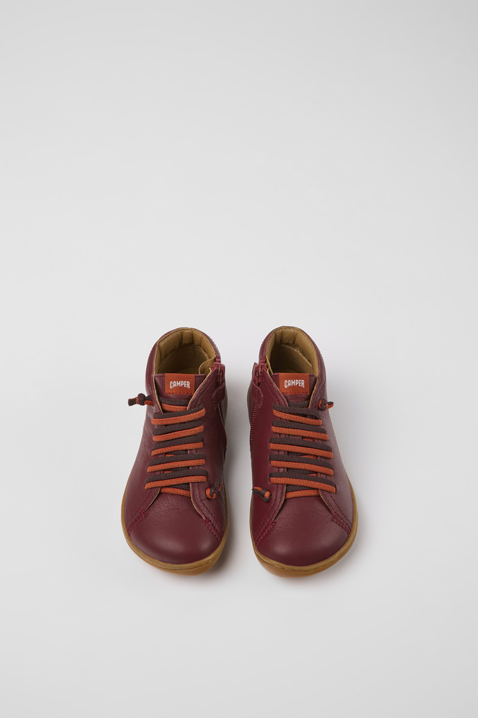 Overhead view of Peu Burgundy leather ankle boots for kids