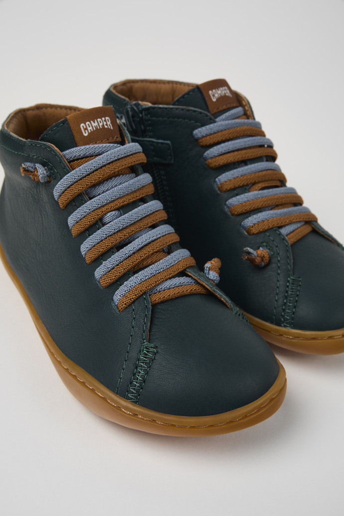 Close-up view of Peu Green leather ankle boots for kids