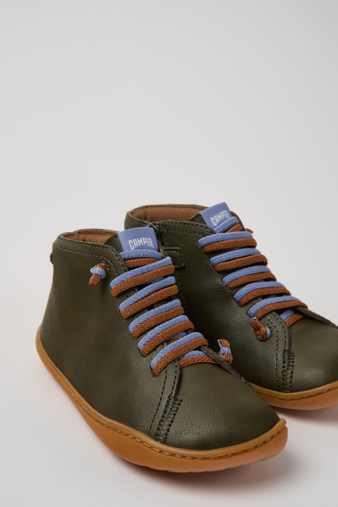 Close-up view of Peu Green Leather and Textile Ankle Boots for Kids.