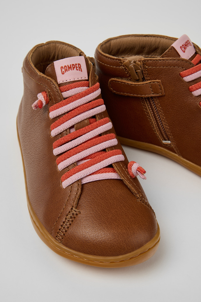 Close-up view of Peu Brown Leather Ankle Boots for Kids.