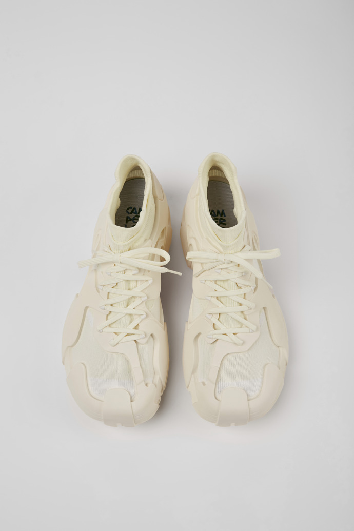 Overhead view of Tossu White caged sneakers