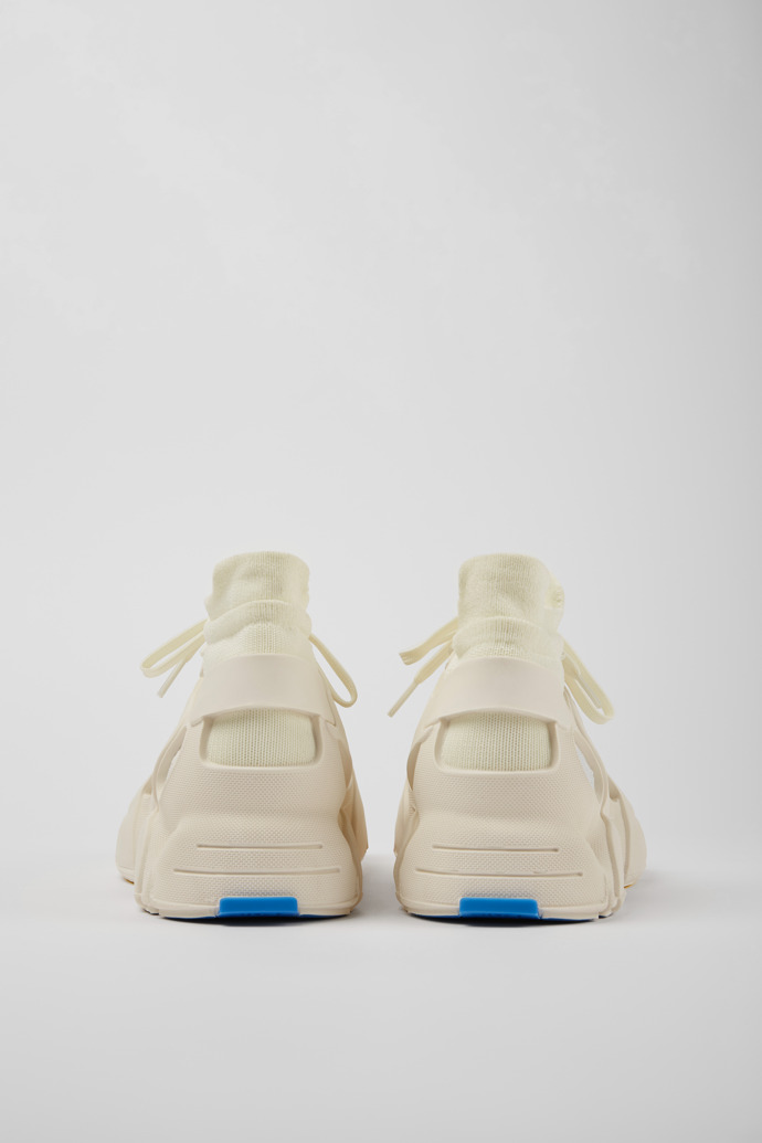 Back view of Tossu White caged sneakers