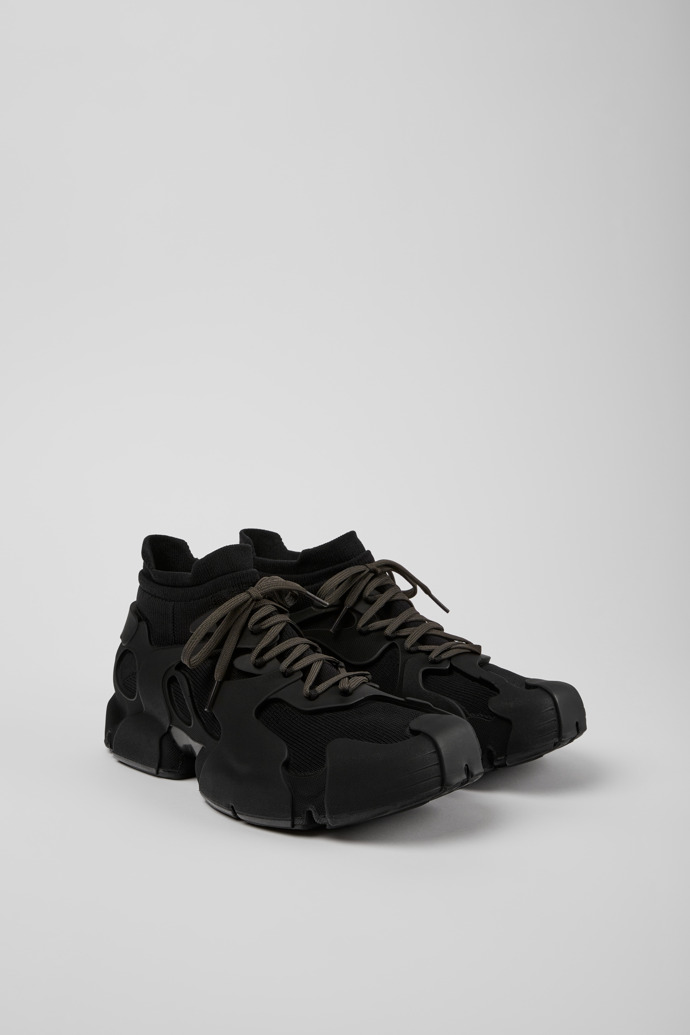 Front view of Tossu Black caged sneakers