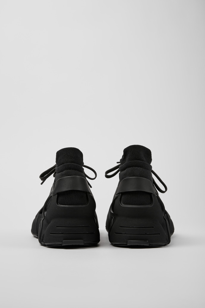 Back view of Tossu Black caged sneakers