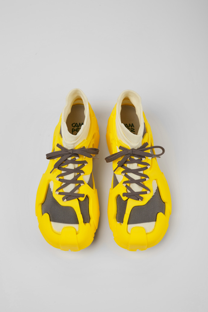 Overhead view of Tossu Yellow caged sneakers