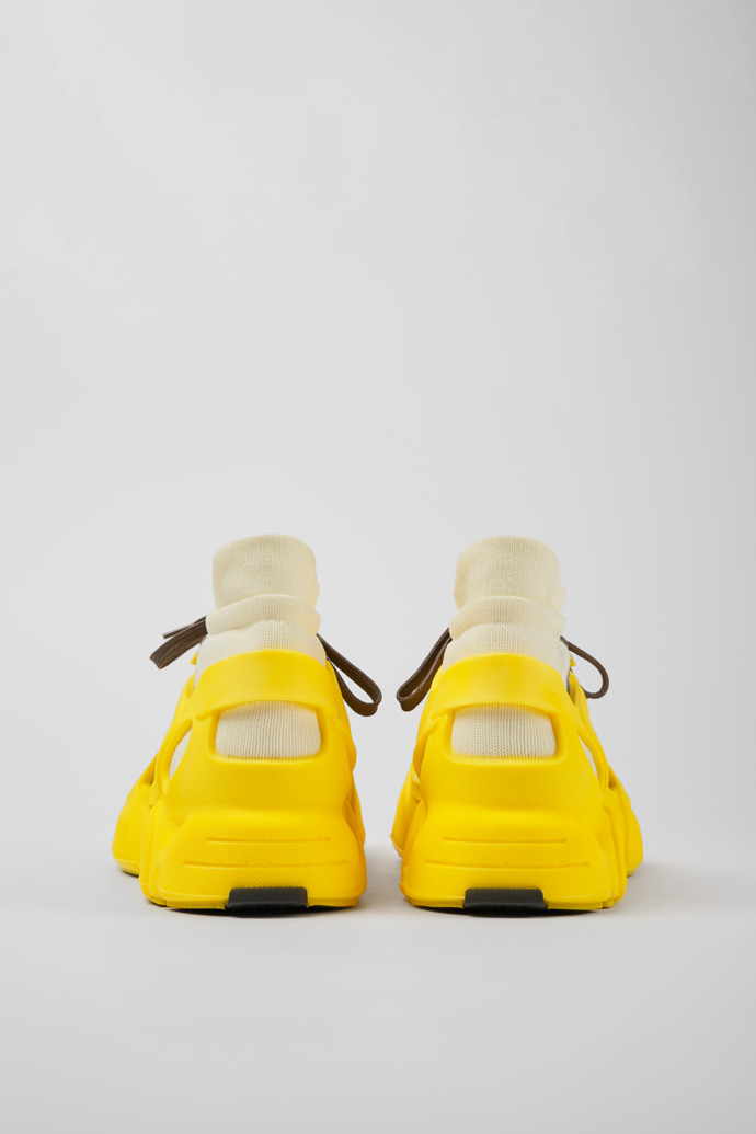 Back view of Tossu Yellow caged sneakers