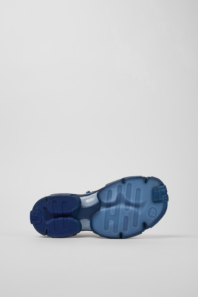 The soles of Tossu Blue caged sneakers