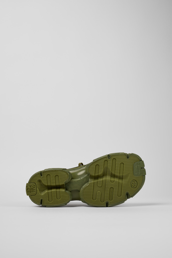The soles of Tossu Green Synthetic Sneaker