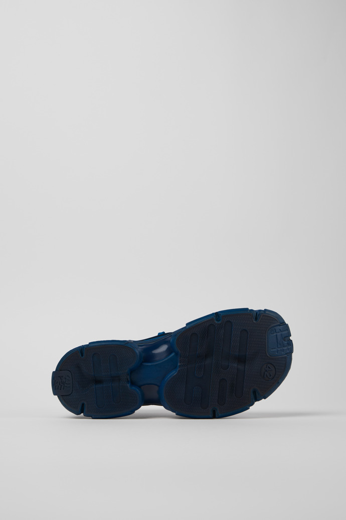 The soles of Tossu Blue Caged Sneakers