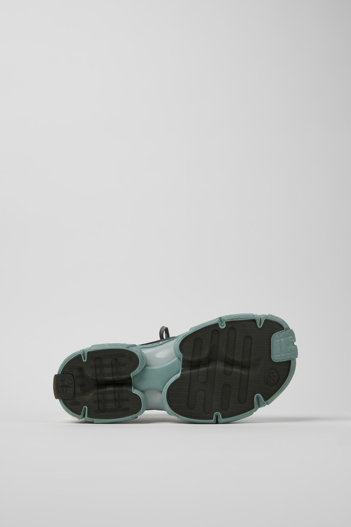 The soles of TOSSU Ice Blue-Gray Caged Sneakers