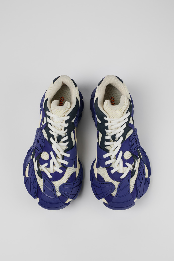 Overhead view of Tormenta Blue and white sneakers