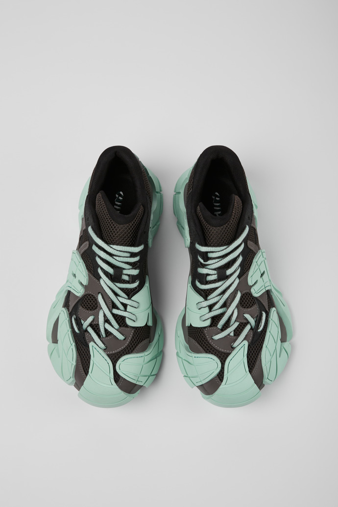 Overhead view of Tormenta Gray and light green sneakers