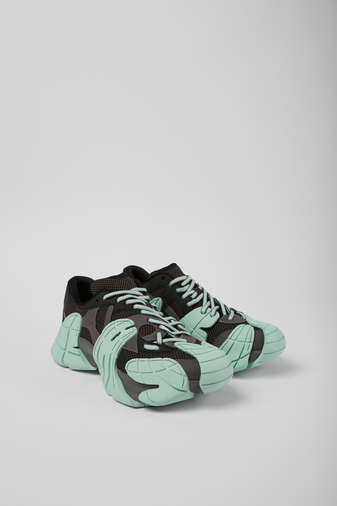 Front view of Tormenta Gray and light green sneakers