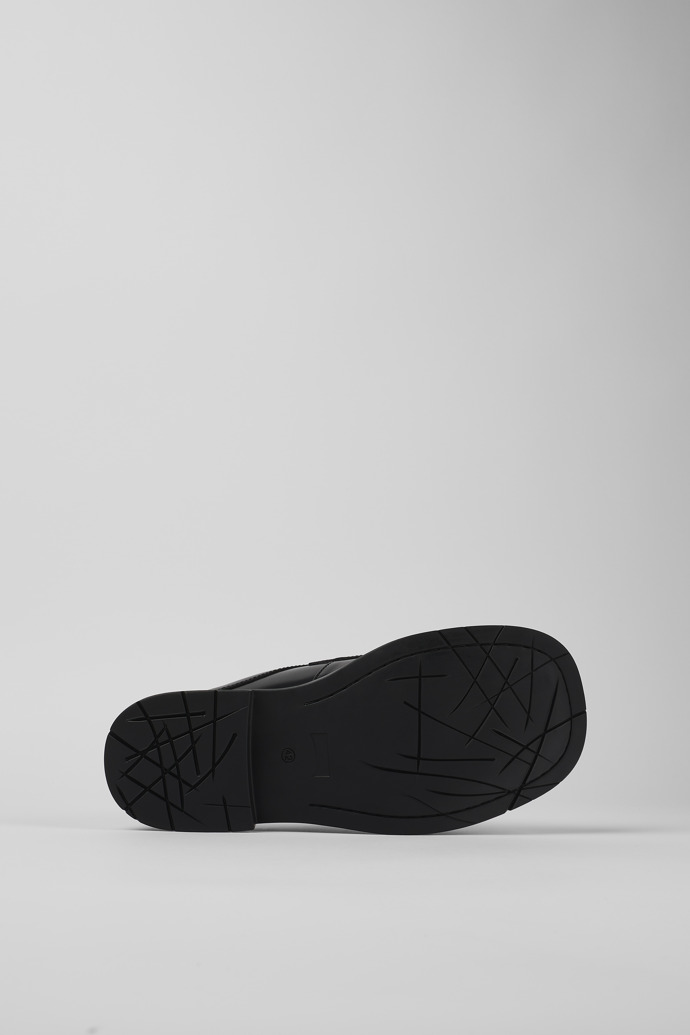 The soles of MIL 1978 Black leather loafer slide