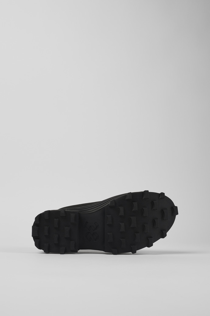 The soles of Traktori Black Textile Clog
