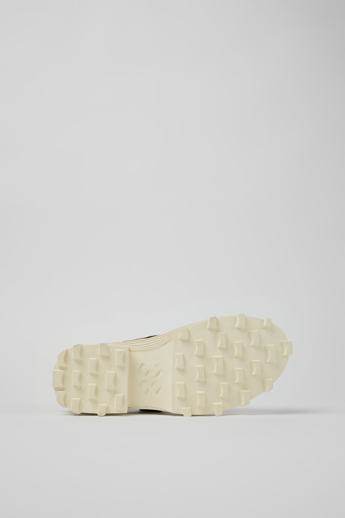 The soles of TRAKTORI Black-White-Brown Leather Mary Jane Clogs