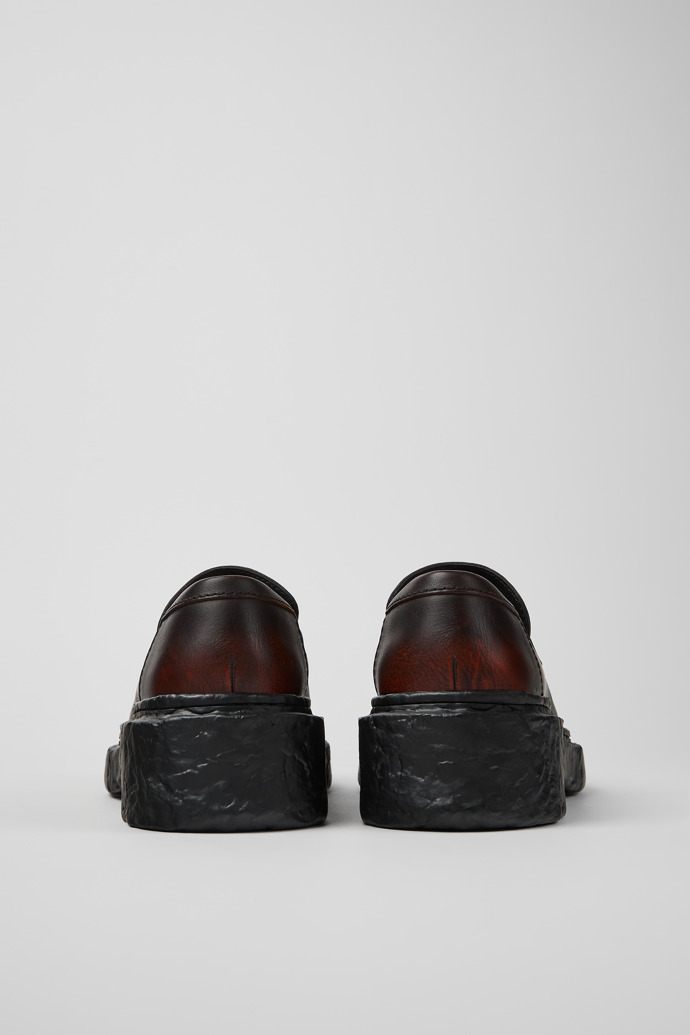 Back view of VAMONOS BLACK-ORANGE