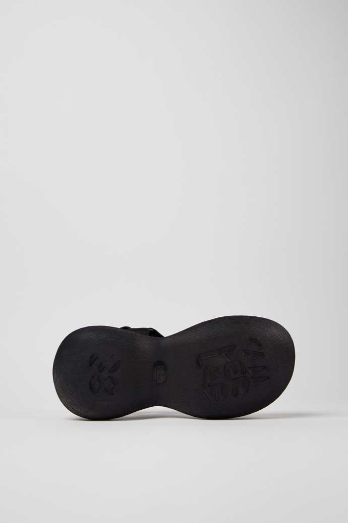 The soles of Caramba Black Recycled PET Sandals