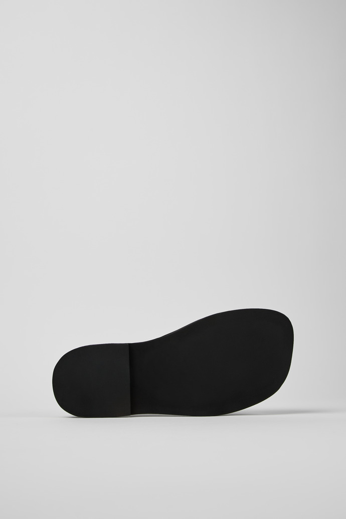 The soles of EKI BLACK