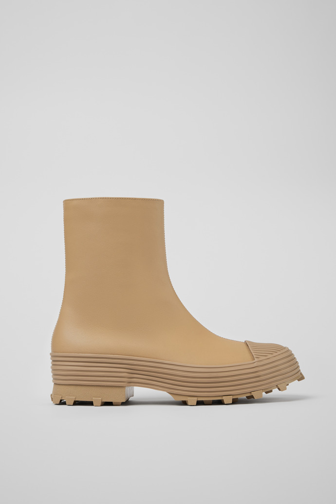Side view of Traktori Beige leather boots