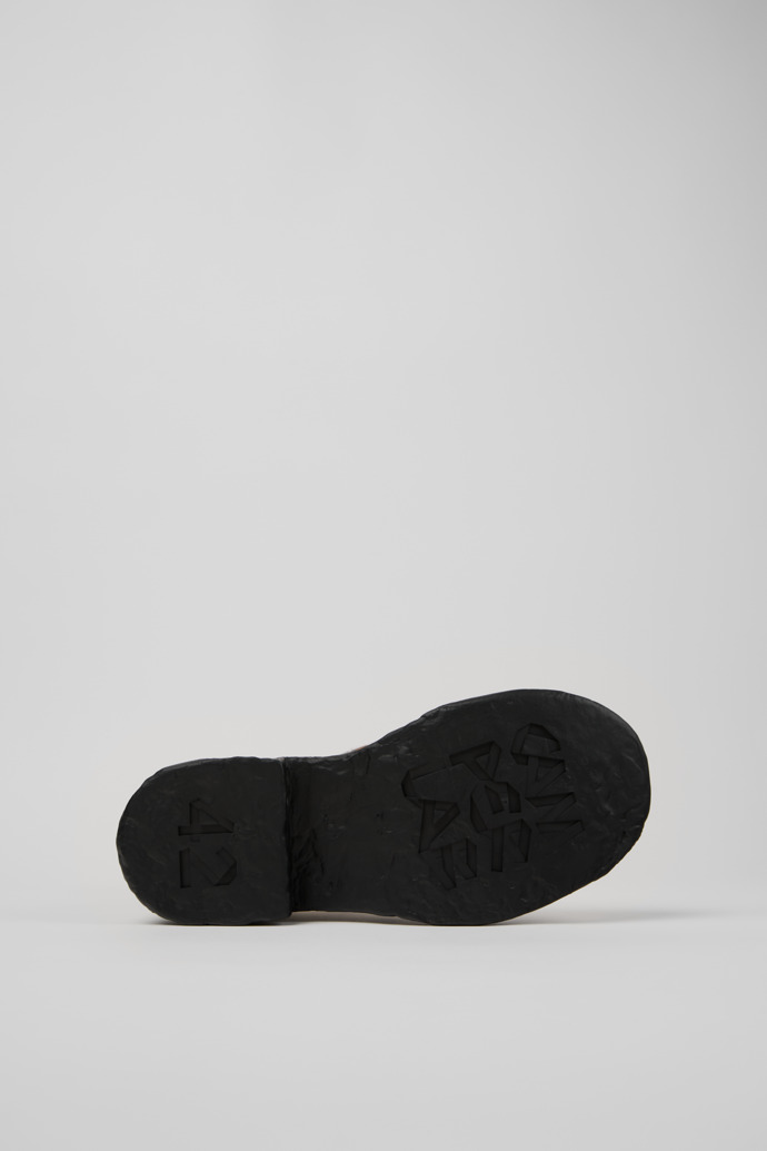 The soles of CAMPERLAB VAMONOS Cream-brown tartan hair-on-leather boots