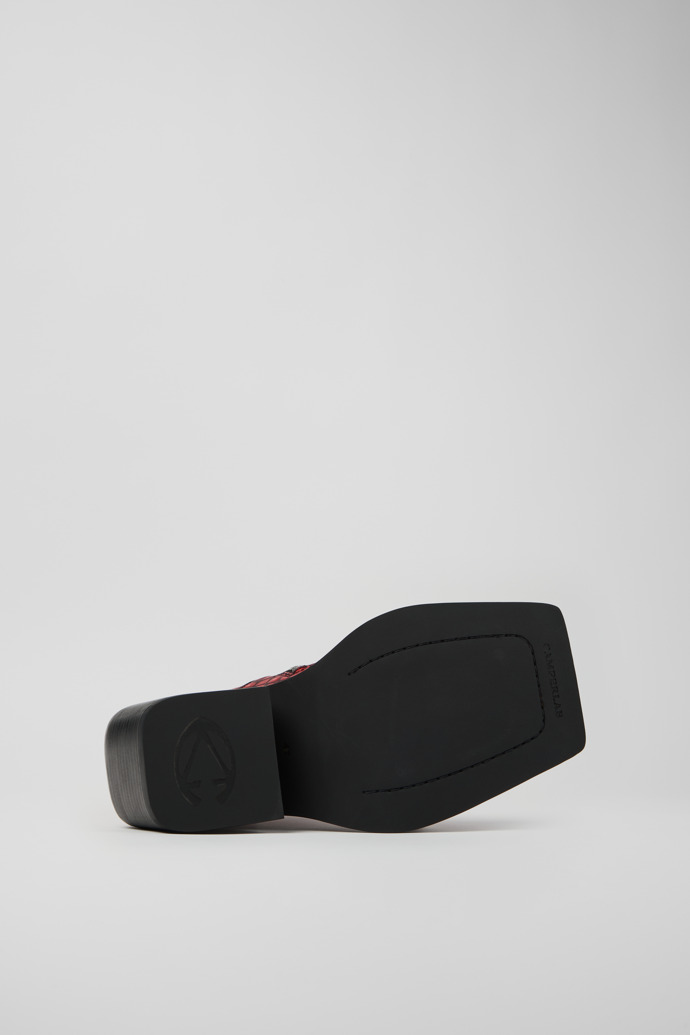 The soles of QUETAL RED