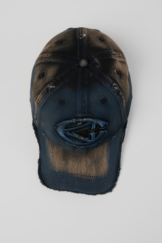 Overhead view of DISTORTED WASHED SPRAYED CAP BLUE
