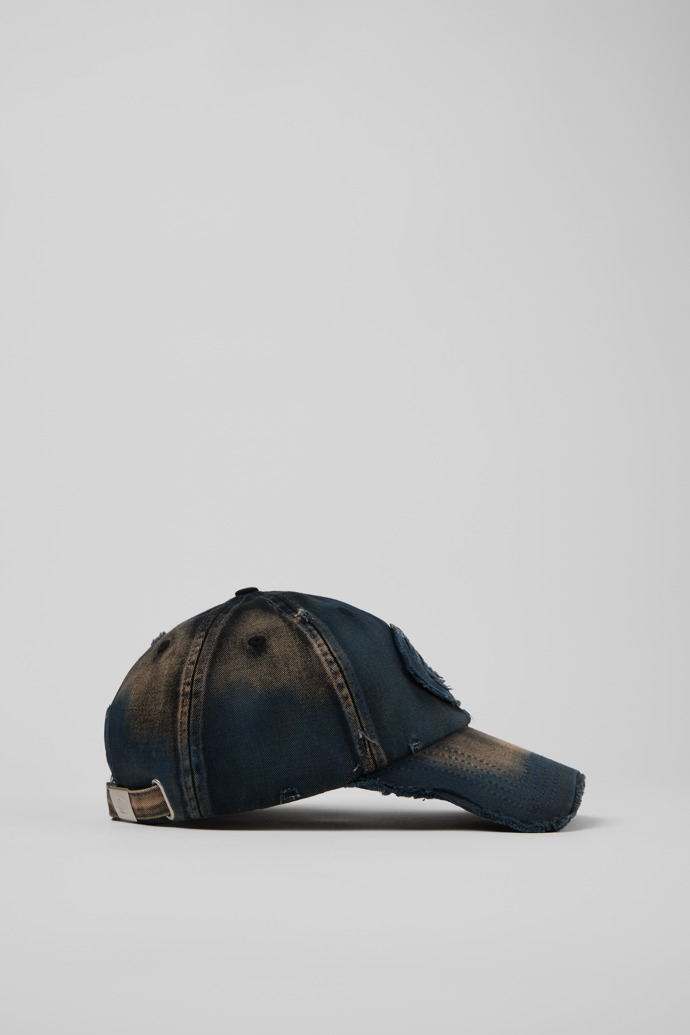 Side view of DISTORTED WASHED SPRAYED CAP BLUE