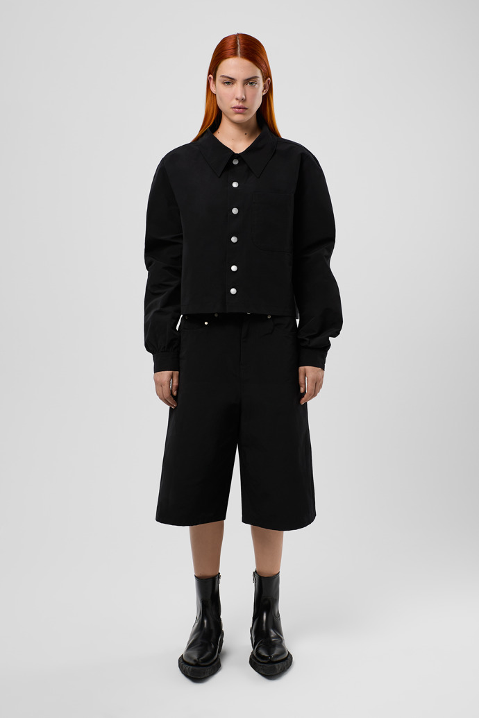 Tech shorts Pantaló curt de cotó/niló de color negre