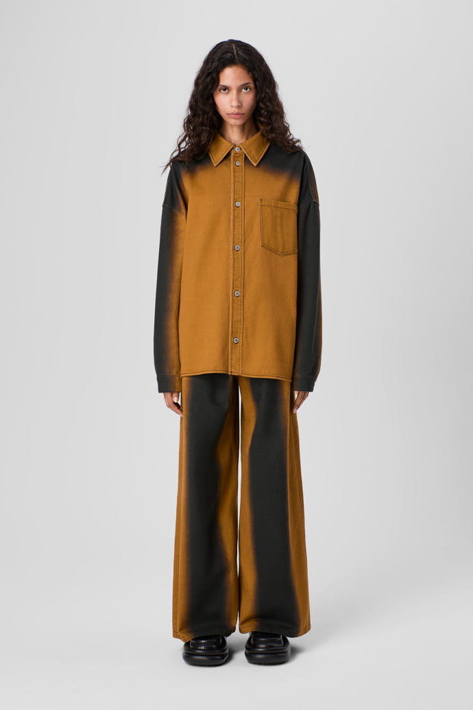 CAMPERLAB DENIM Terracotta bootcut jeans with printed spray effect