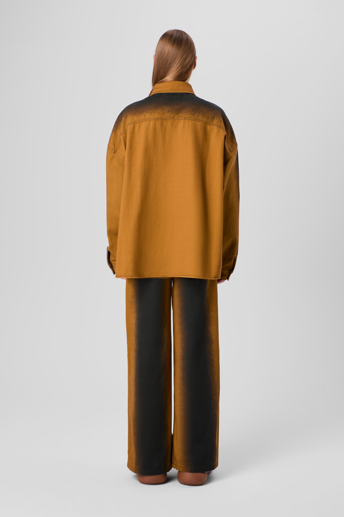 CAMPERLAB DENIM Terracotta bootcut jeans with printed spray effect