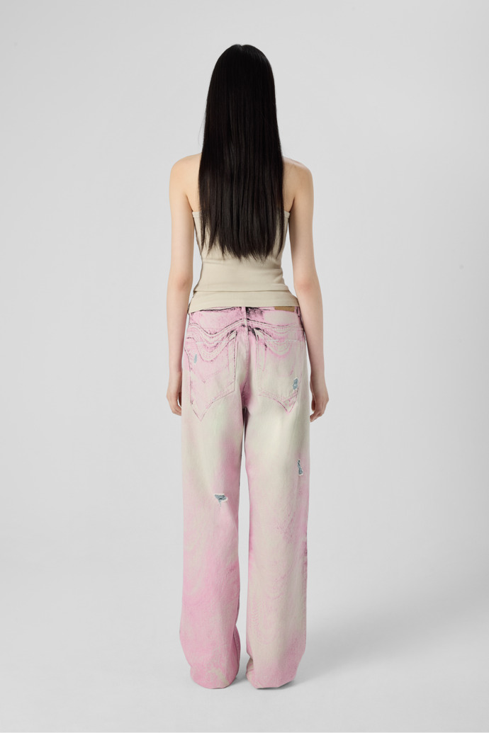 DISTORTED PRINT DISTRESSED DENIM JEANS