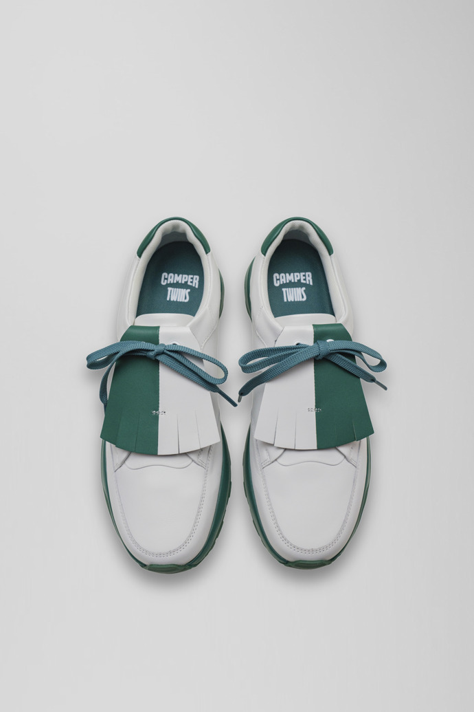 Overhead view of Spackler White and green leather golf sneakers
