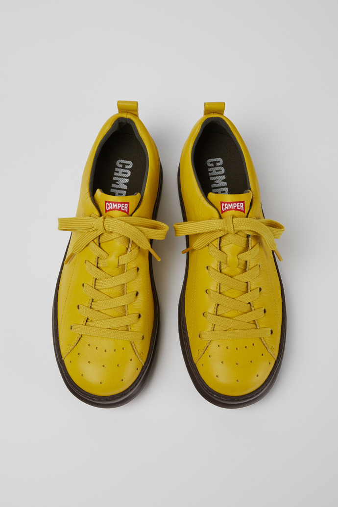 Overhead view of Runner Yellow leather sneakers