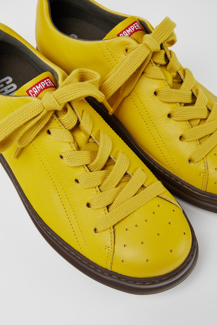 Close-up view of Runner Yellow leather sneakers