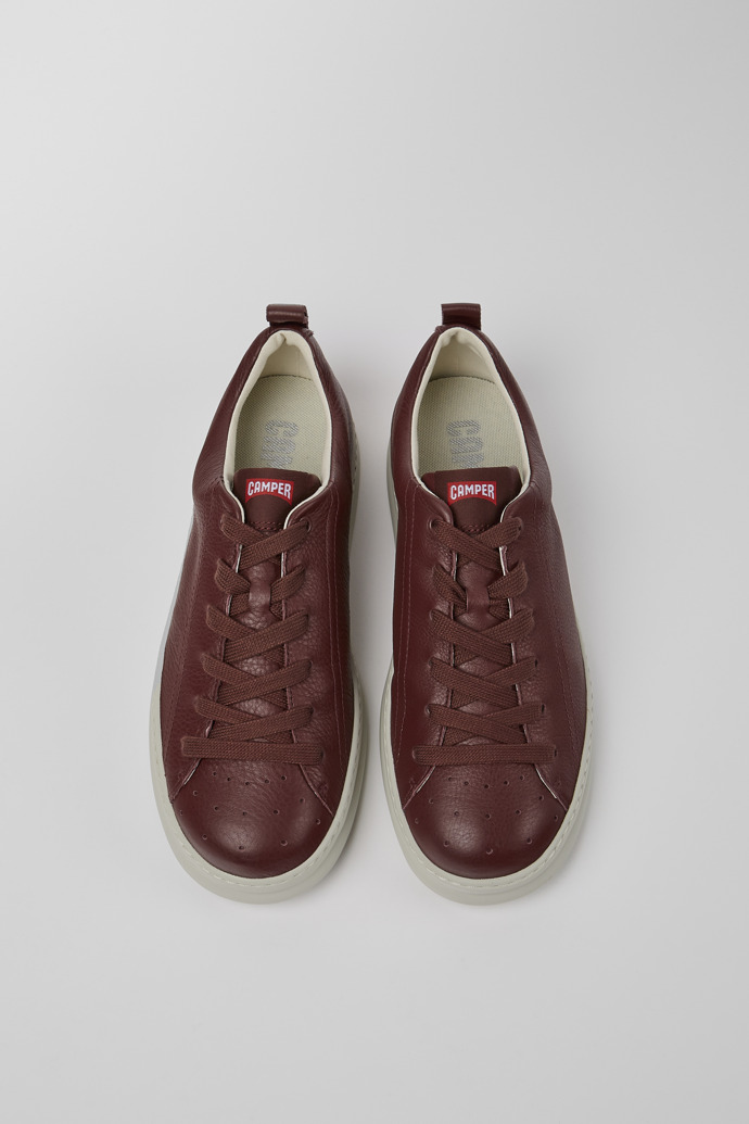 Overhead view of Runner Burgundy leather sneakers