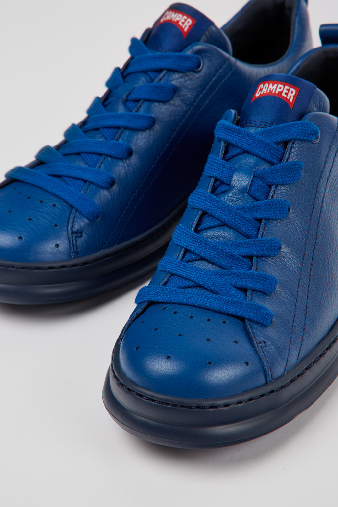 Close-up view of Runner Blue leather sneakers for men