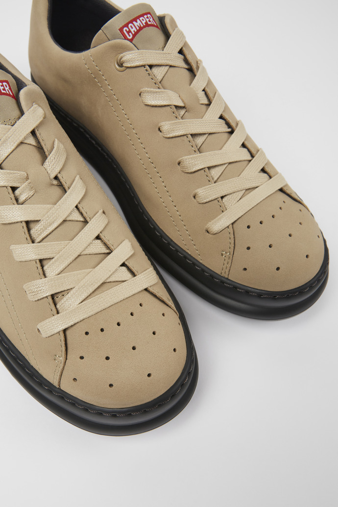 Close-up view of Runner Beige nubuck sneakers for men