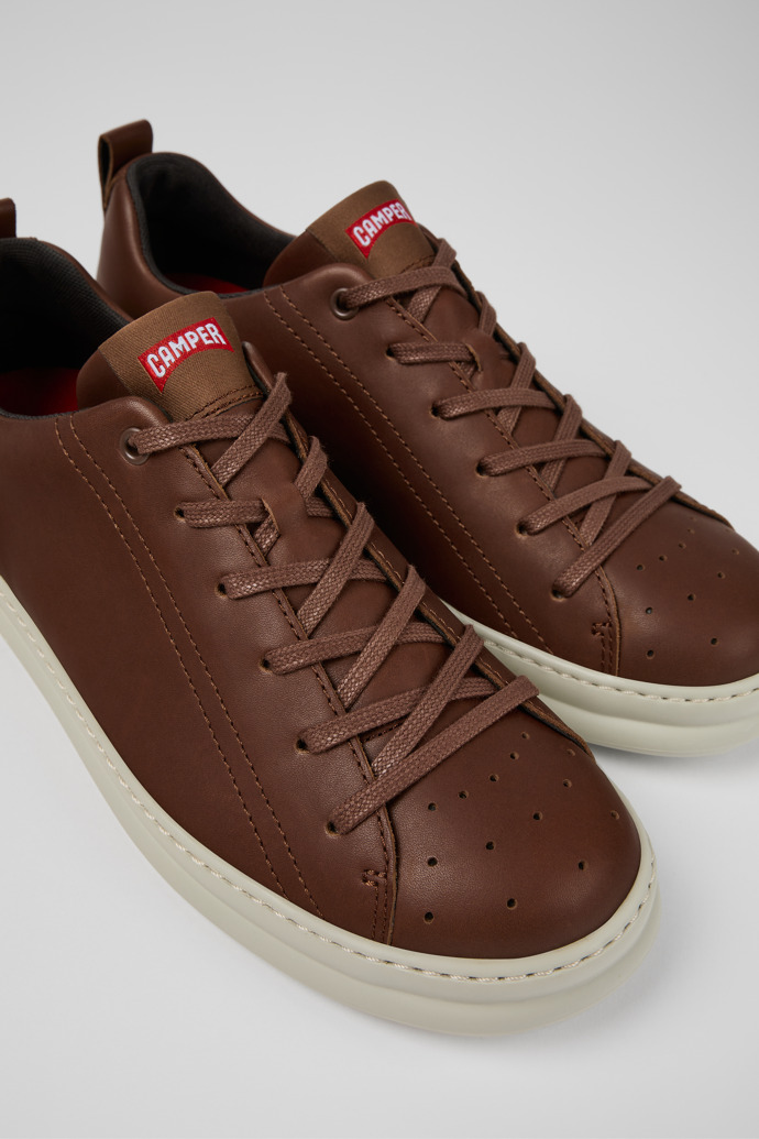 Close-up view of Runner Brown leather sneakers for men