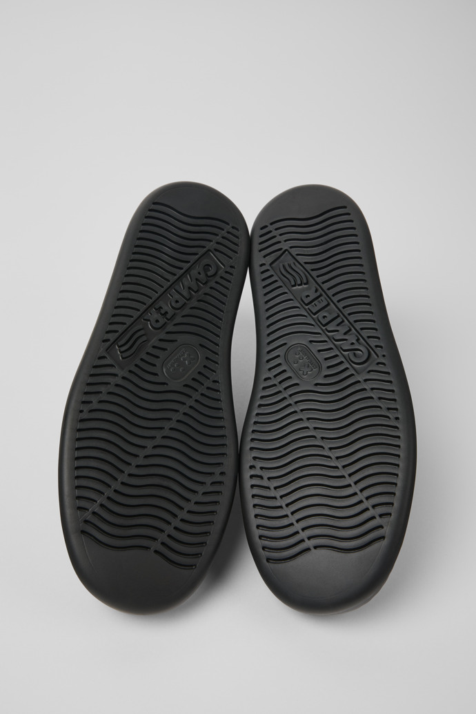 The soles of Runner Gray leather sneakers for men