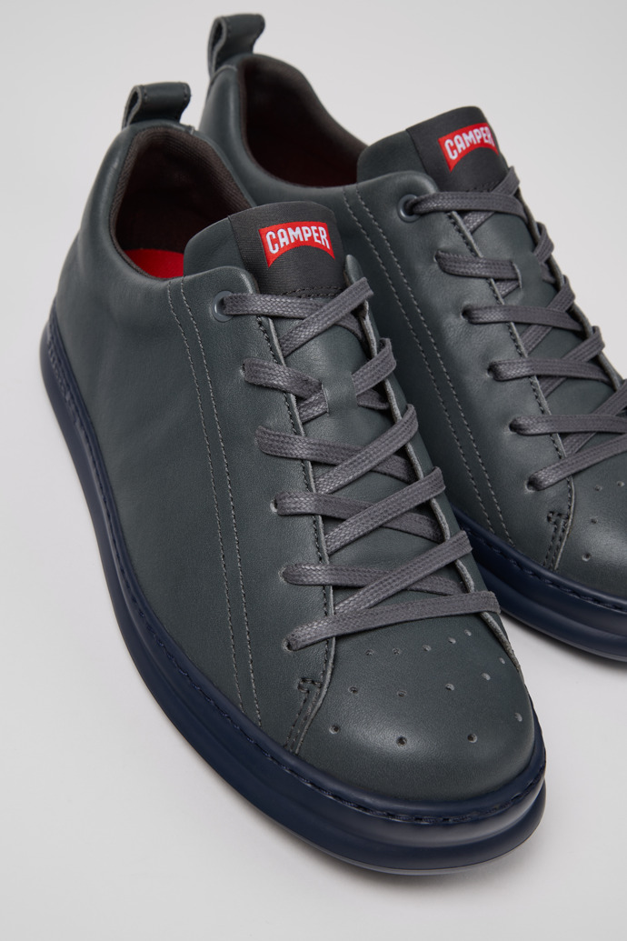 Close-up view of Runner Gray Leather Sneakers for Men.