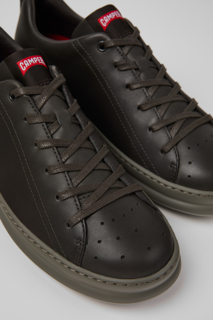 Close-up view of Runner Gray Leather Sneakers for Men.