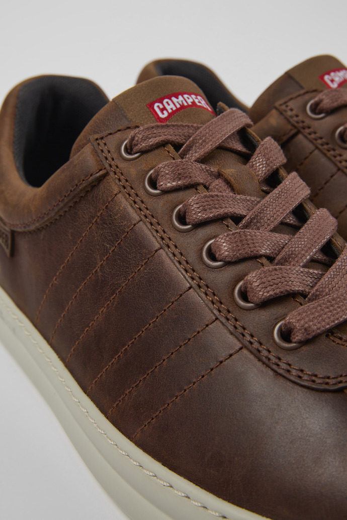 Close-up view of Runner Brown leather sneakers for men